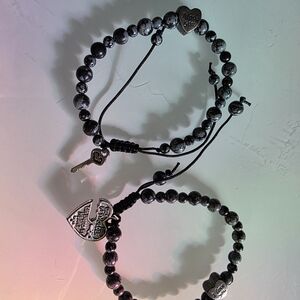 Black and Gray Beaded Bracelets with Charms